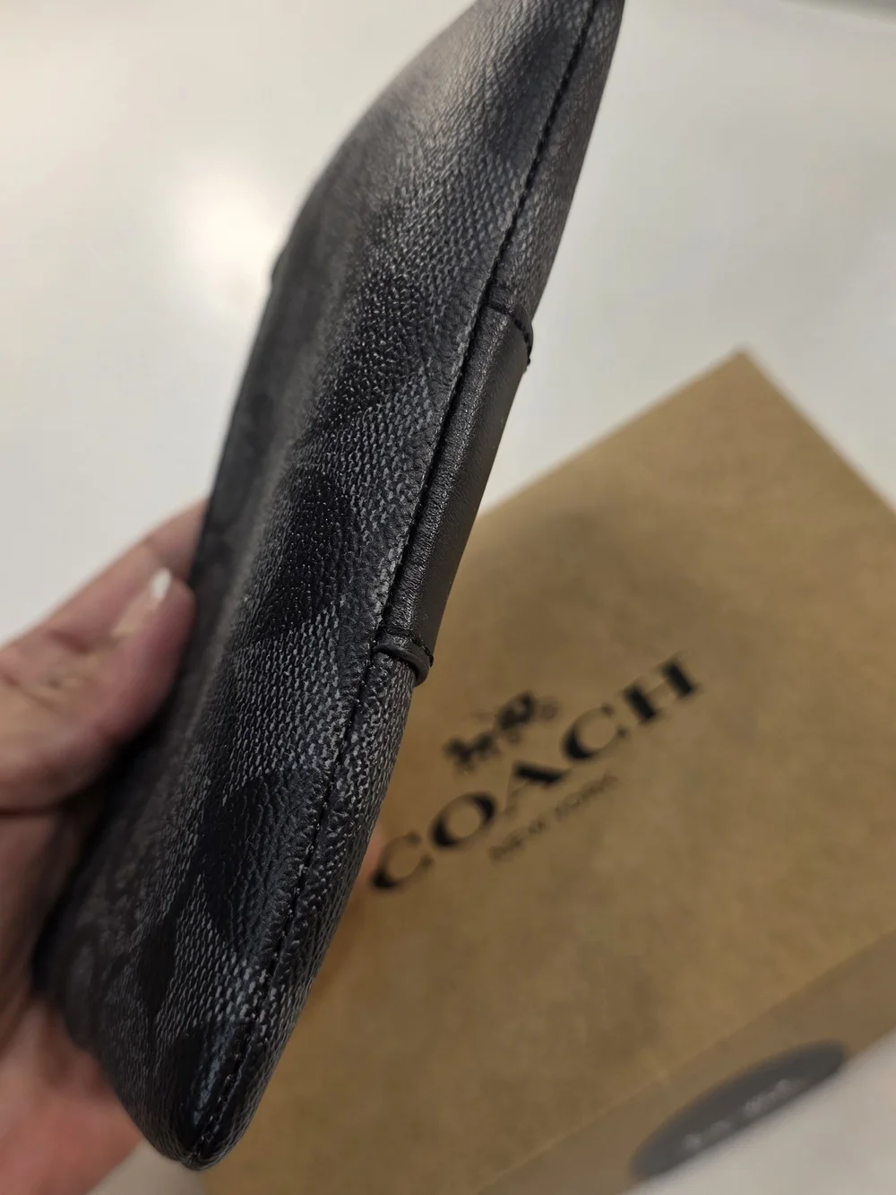 COACH Black Signature Zip Wristlet